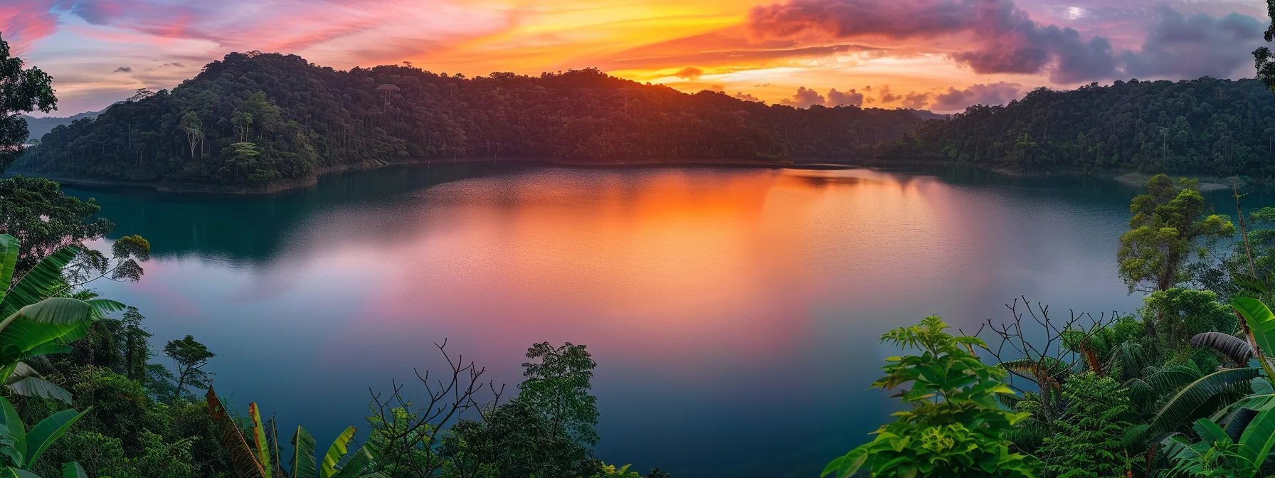 a vibrant sunrise casts a golden glow over a tranquil lake, reflecting the colorful hues of the sky and surrounded by lush, verdant trees.