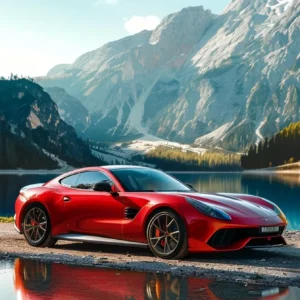 a shiny red sports car parked in front of a picturesque mountain backdrop.