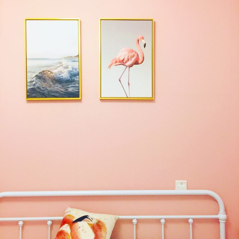 a wall with pictures on it