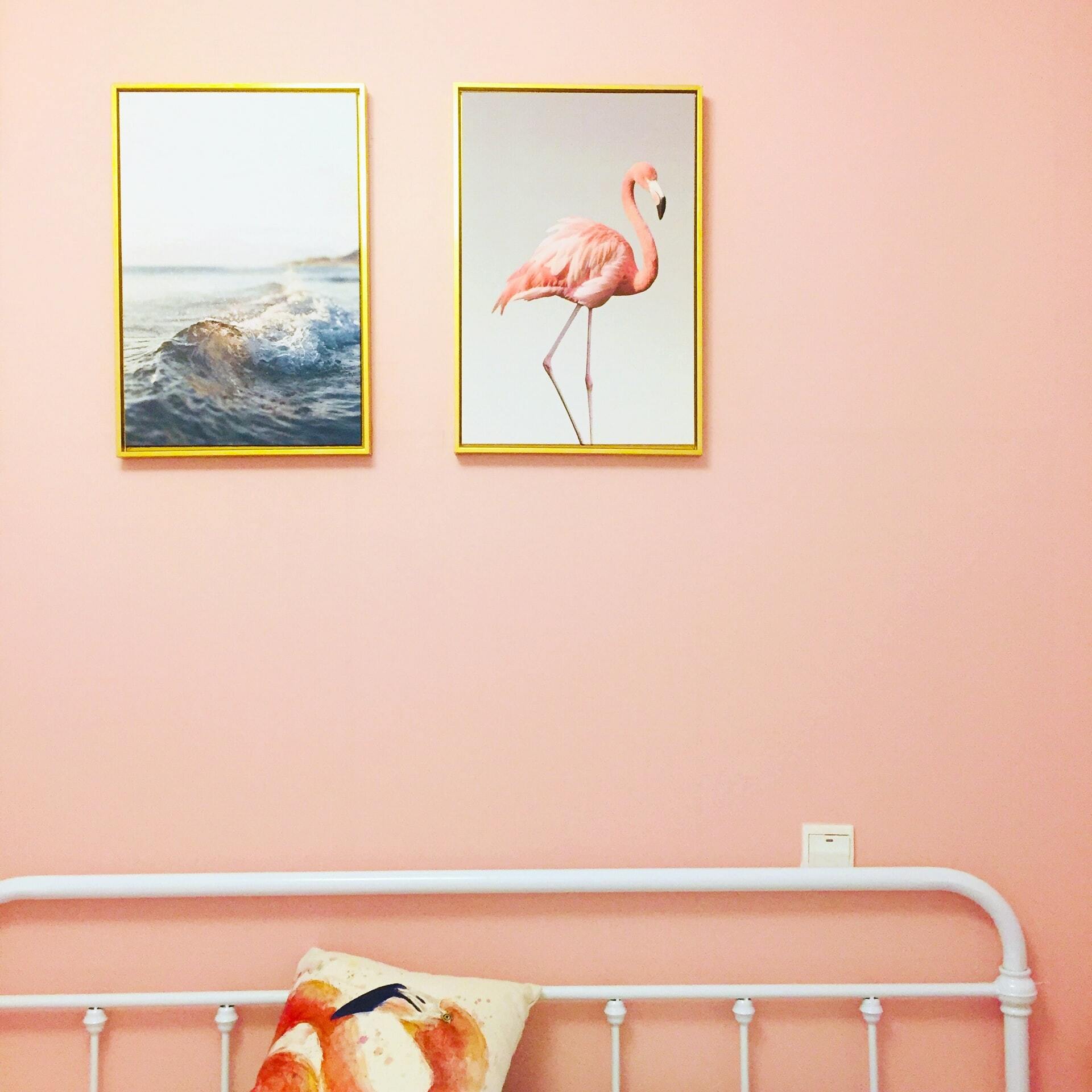 a wall with pictures on it