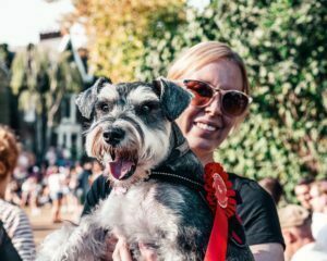 a person holding a dog