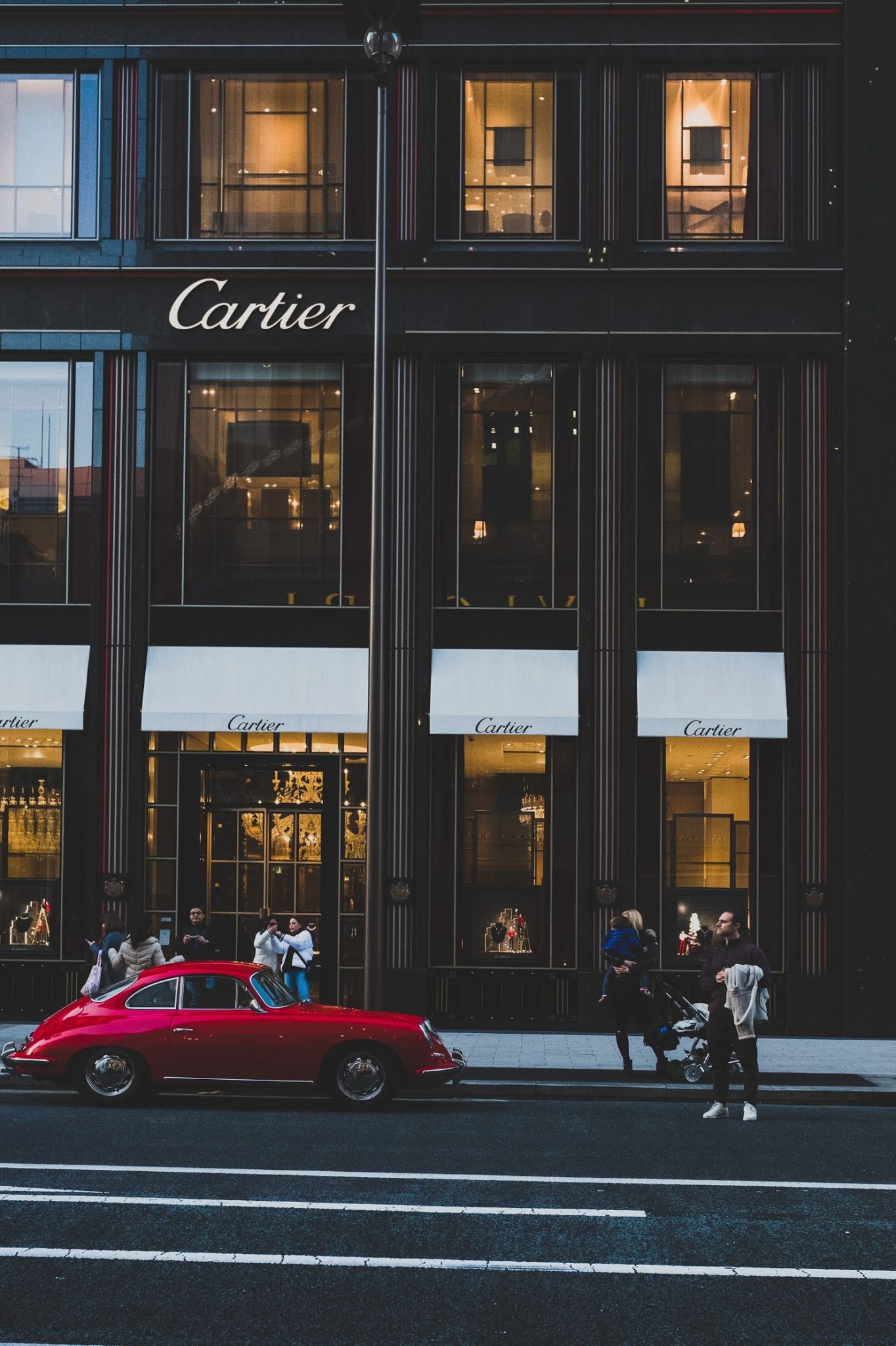 a red car on a street