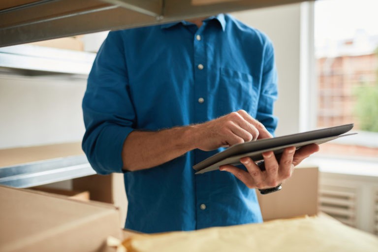 a person holding a tablet